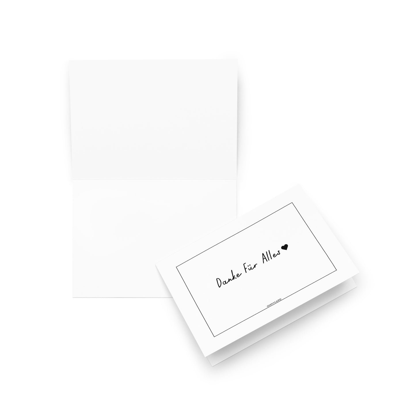 Die ohmycard Danke Für Alles HERZ ist eine weiße Karte mit dem Schriftzug "Danke für Alles" und einem kleinen Herz auf der Vorderseite; eine Karte ist geschlossen, die andere ist geöffnet, so dass das leere Innere sichtbar wird.