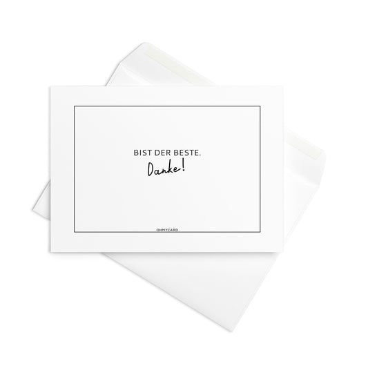 Die weiße Grußkarte "Bist DER Beste!" von ohmycard zeigt deutschen Text, schwarzen Rand und minimalistisches Design auf weißem Umschlag.
