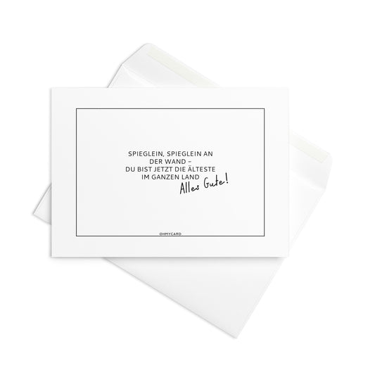 Die Geburtstagskarte "Spieglein Spieglein" von ohmycard: Weiße Karte mit dem deutschen Spruch "Spieglein, Spieglein an der Wand - du bist jetzt die Älteste im ganzen Land. Alles Gute!" und passendem Umschlag.