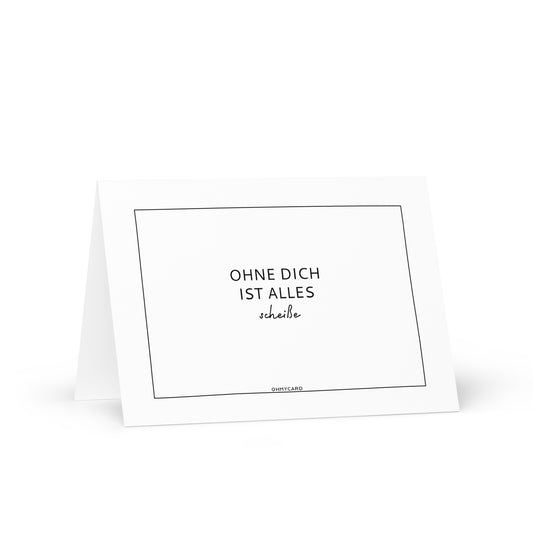 Die "Ohne dich ist alles..." Grußkarte von ohmycard besticht mit schwarzem Rand und dem Schriftzug "OHNE DICH IST ALLES scheiße" - das perfekte, liebevolle Geschenk für deine Lieblingsmenschen.